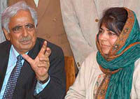 PDP chief (left) Mufti Mohammad Sayeed and PDP president Mehbooba Mufti address newsmen in Srinagar on Saturday.