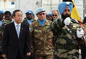U.N. Secretary General Ban Ki-moon (L) walks next to Major-General Claudio Graziano of Italy, commander of the U.N. peacekeeping force in Lebanon, upon his arrival at the UNIFIL headquarters in Naqoura, southern Lebanon, on Saturday
