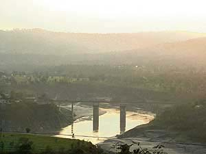 A view of the sunset at Kandrour in Bilaspur district . Also seen is the Kandrour bridge over Govind Sagar. This is the highest bridge in Asia built more than three decades ago