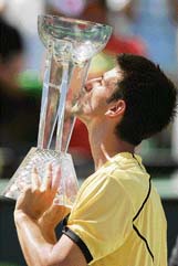 Novak Djokovic of Serbia kisses the trophy after beating Argentinas Guillermo Canas in the final of the Sony Ericsson Open in Miami on Sunday. Djokovic won 6-3, 6-2, 6-4. 