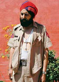 A Head constable Karmjit Singh, whose uniform was torn by two youths at Amritsars railway station on Tuesday.