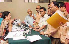 Tourism minister Kiran Chaudhary listens to the grievances of the public at a district grievances committee meeting at the district secretariat, Sector 1, Panchkula, on Wednesday.