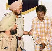 Balkar Singh, accused in the acid attack case in custody of the Ludhiana police.