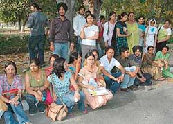 Students of physiotherapy sit on a dharna outside vice-chancellor Jai Rup Singhs office at Guru Nanak Dev University, Amritsar,