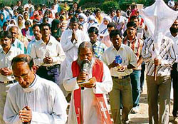Devotees take part in a procession to mark Good Friday in Chandigarh