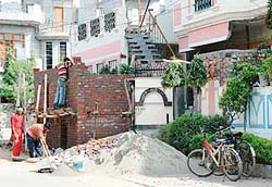 Construction work under way on BJP MLA Anil Joshis house in Medical Enclave, Amritsar, allegedly on encroached land
