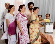 A lady doctor casting her vote during the IMA elections in Ludhiana
