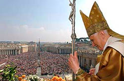 Pope Benedict XVI delivers the traditional Easter message from the central loggia of St Peters Basilica in the Vatican on Sunday