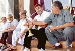 All for a breather: For liquor distributors from all over Haryana, the temptation of puffing on a hooka was hard to resist. They came out of the Haryana tourism resort, Red Bishop, in Panchkula for a puff on Monday