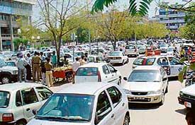 Haphazard parking of vehicles at sub-centre, Sector 34, Chandigarh, speaks volumes of traffic management in paid-parking zones.