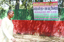 A hoarding put outside the DPCC office demanding the ouster of DPCC president Ram Babu Sharma after the party lost power in the MCD House