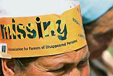 A woman, whose son is missing, at a meeting of the Association of Parents of Disappeared Persons in Srinagar on Tuesday.