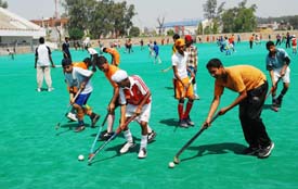 Players participating in the trials being conducted by the Punjab sports department at Olympian Surjit Hockey Stadium at Jalandhar on Tuesday.