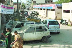 With no proper space, the officials of police station (division no 7) near Garha are forced to dump stuff in the open.