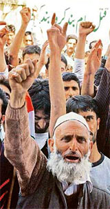 Party supporters shout pro-Pakistan slogans during a welcoming ceremony for senior separatist leader and chairman of the Jammu and Kashmir National Front, Nayeem Khan, in Srinagar on Wednesday.