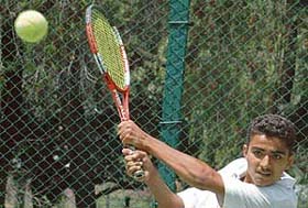 Haryanas Suraj Beniwal in action during a semifinal match of the AITA meet at the CLTA, Sector 10, Chandigarh