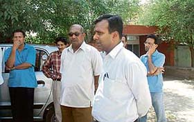 Son of the victim Pankaj Gupta (extreme right) at the General Hospital, Sector 16