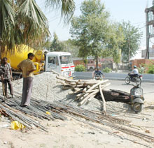 Construction material lying on the road.