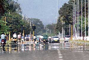 Hot conditions cause an optical illusion on a road in Chandigarh.