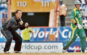 New Zealands Craig McMillan celebrates after dismissing South Africas Mark Boucher during the Super Eight match at the Grenada National Stadium in St Georges