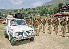 Chief Minister Virbhadra Singh inspects the parade at the state-level Himachal Day function held at Rohru in Shimla on Sunday