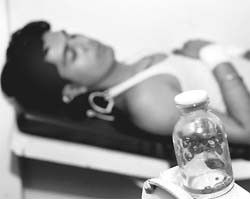 A view of four pellets in a vial which were removed from the body of Pawan Kumar at the Civil Hospital, Karnal, on Sunday