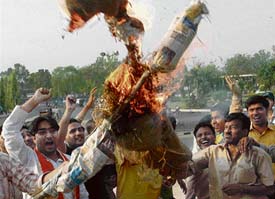 Activists of the Bajrang Dal burn an effigy of Hollywood actor Richard Gere for imposing himself on actress Shilpa Shetty during a function on AIDS awareness, in Chandigarh on Monday.