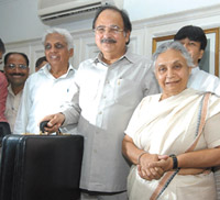 Delhi Finance Minister Dr A. K. Walia poses with Chief Minister Sheila Dikshit before presenting the Budget at the Old Secretariat in the Capital