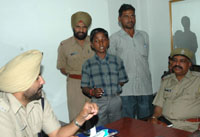 Anand (centre), who was recovered from Ambala cantonment railway station.
