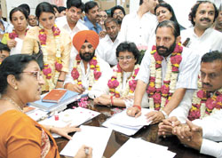 BJP leaders filing their nomination forms in the office of MCD officer at Town Hall