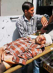 One of the injured being shifted to an ambulance in Jammu.
