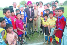 Milkha Singh along with budding hockey talent, former Olympians and international players at Sansarpur near Jalandhar.