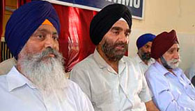 Members of the Jammu Gurdwara Parbandhak Committee address mediapersons in Jammu on Wednesday.