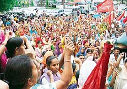 Industrial workers and farmers hold a protest rally at Mini Secretariat in Ludhiana