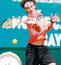 Spanish Tommy Robredo hits a return to his French opponent Arnaud Clement during their Monte Carlo ATP Masters Series tournament match in Monaco on Wednesday. 