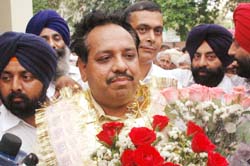 A greeting monent: Avinash Chander is welcomed after becoming the Chief Parlimentary Secretary in Jalandhar.