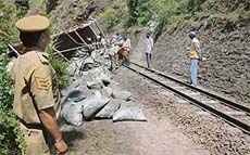 Traffic on the Shimla-Kalka rail track remained suspended for over four hours on Sunday after a truck laden with cement fell on it near Kaithlighat