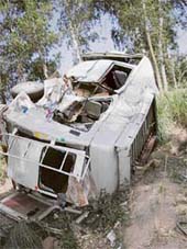 The mini tourist bus which overturned after it collided with a truck on the Ambala-Jagadhri road on Sunday