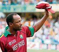 West Indies captain Brian Lara greets the crowd after playing his last international cricket match in the Super Eight round against England at the Kensington Oval in Bridgetown, Barbados.