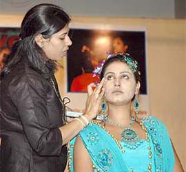 A participant at a workshop on hairstyle at B.P.S. Planetarium in Ambala.