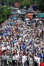 A large number of refugees from PoK march towards the border in Jammu on Tuesday.
