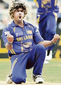 Sri Lankas Lasith Malinga celebrates after dismissing New Zealand captain Stephen Fleming during the first semifinal in Kingston on Tuesday. 