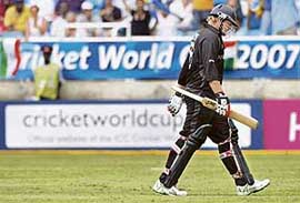New Zealands Scott Styris leaves the field after being dismissed during their World Cup semifinal match against Sri Lanka in Kingston on Tuesday.