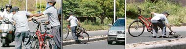Wayward: Two schoolboys enter into a scuffle at Vidya Path, Chandigarh; and unmindful of the traffic, one of them crosses the road divider with his cycle while his schoolbag falls off