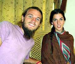 Argentinean couple, Michel and Jasmine, pose for a photograph at a hotel at Fatehabad on Thursday.
