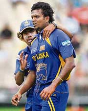Sri Lankas Dilhara Fernando (right) with team-mate Lasith Malinga during the World Cup semifinal against New Zealand on Tuesday. 