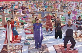 Citizens of Amritsar participate in a yoga camp conducted by Swami Karamvir.