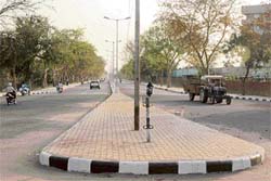 At last, the road opens: The stretch of concrete road between Sectors 31 and 32 that was thrown open to traffic in Chandigarh on Friday. A Tribune photograph
