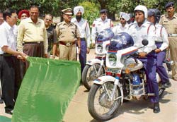 Inspector general of police S.K. Jain flags off teams of officers who are part of the mobile public address system at Children’s Park, Sector 23, Chandigarh