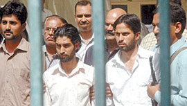 Lashkar-e-Toiba militants Abu Kasim of Pakistan, Sahbir and Shaukat of Jammu and Kashmir in police custody in the Capital on Friday.